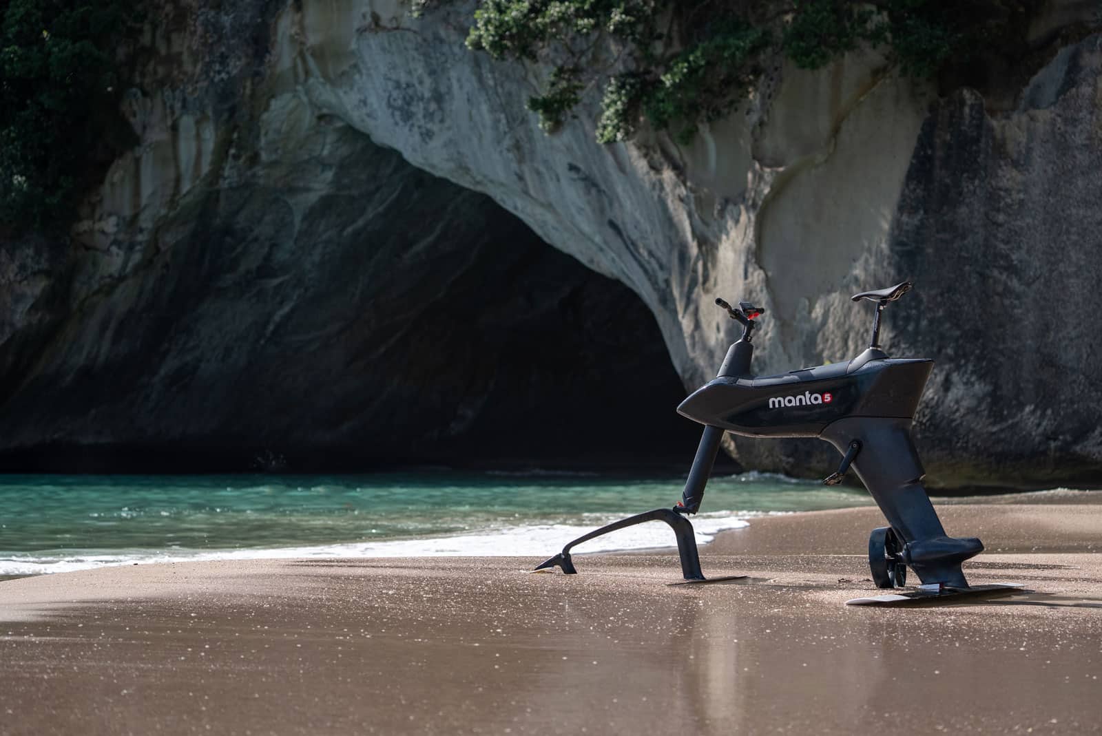 Hydrofoiler SL3 standing on the beach at Cathedral cove